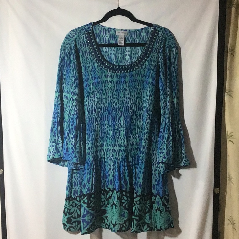 Plus size 3X top, turquoise with dark blue accents design. 100% polyester.